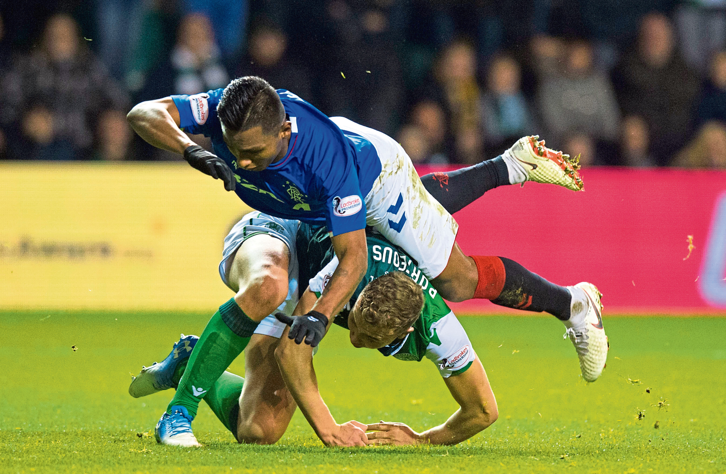 aaa
19/12/18 LADBROKES PREMIERSHIP
HIBERNIAN v RANGERS (0-0)
EASTER ROAD - EDINBURGH
HIbs' Ryan Porteous tackles Alfredo Morelos