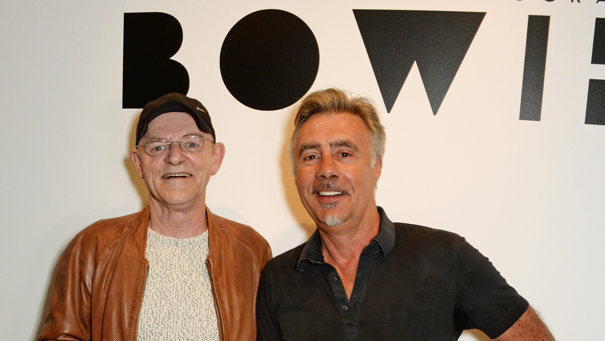 Mick Woodmansey (L) and Glen Matlock attend a private view of new exhibition 'David Bowie: Fame, Fashion, Photography' at The Hub. (David M. Benett/Dave Benett/Getty Images)