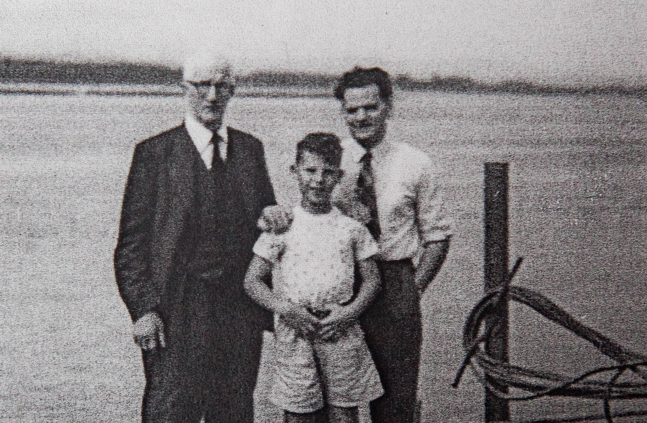 Henry with his dad and grandfather.