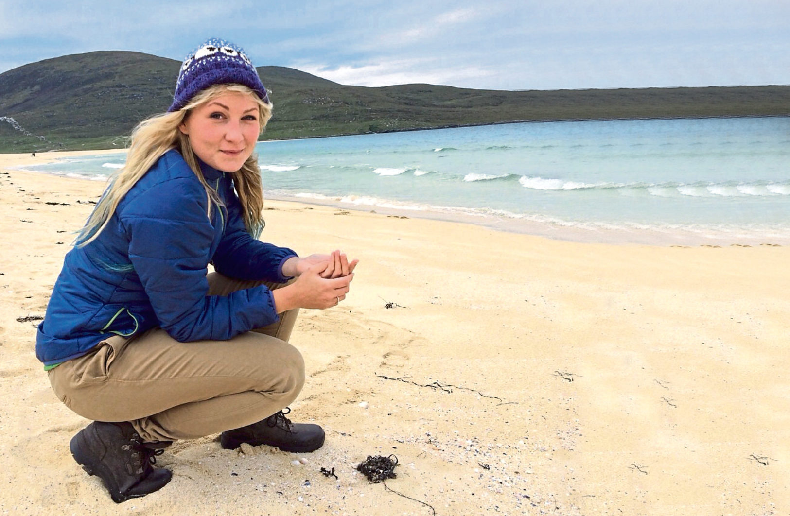 Campaigner Katie Tunn on Scarista beach, Harris, found ties from Arctic Fish plant in Donegal, Ireland