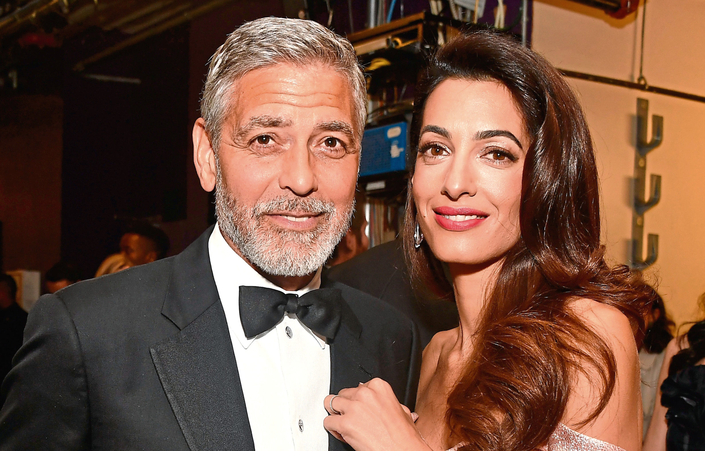 George Clooney (L) and Amal Clooney attend the American Film Institute's 46th Life Achievement Award Gala Tribute to George Clooney at Dolby Theatre in Hollywood, California.  (Frazer Harrison/Getty Images for Turner)