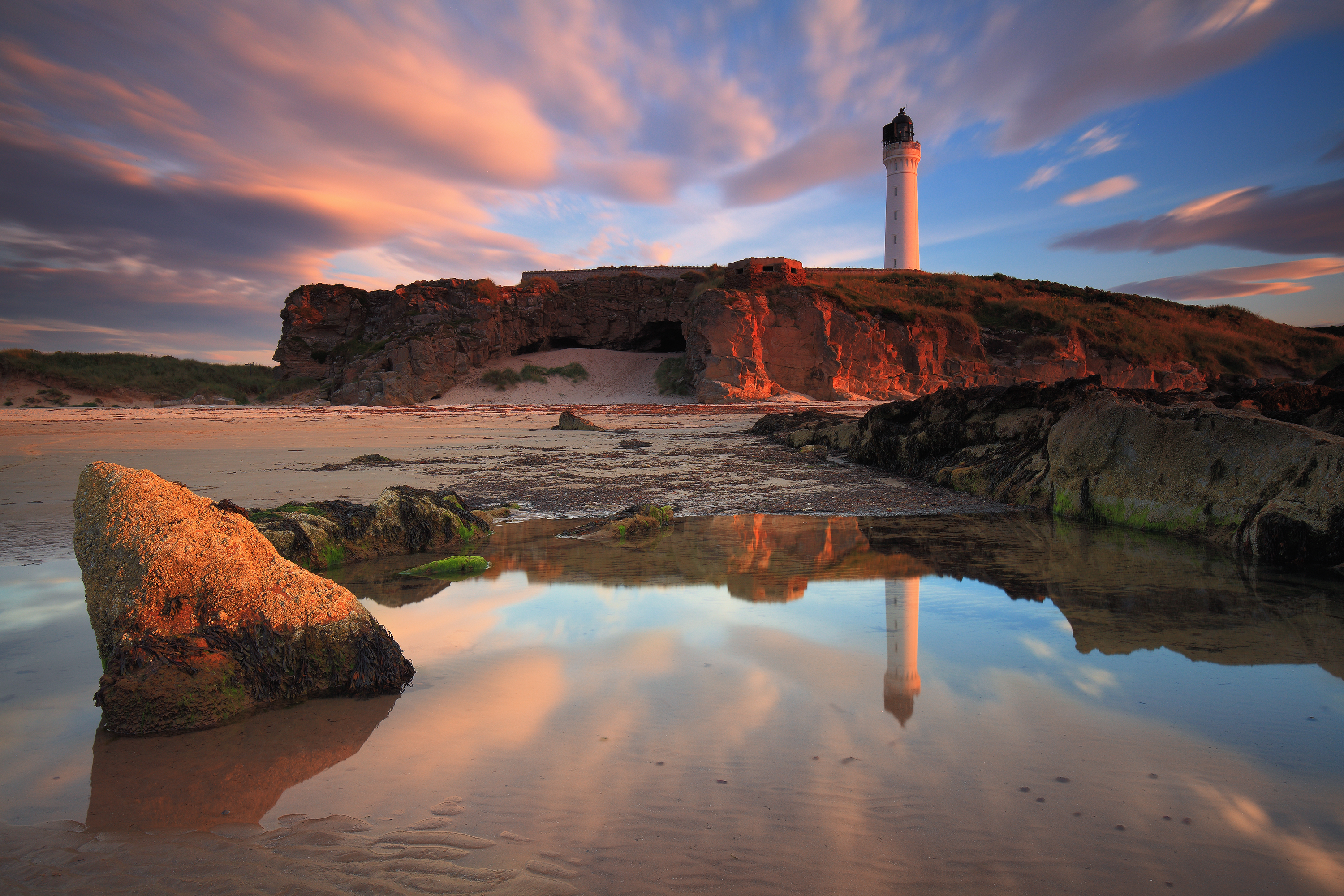 Amazing sunset over the Lossiemouth lighthouse in Moray.