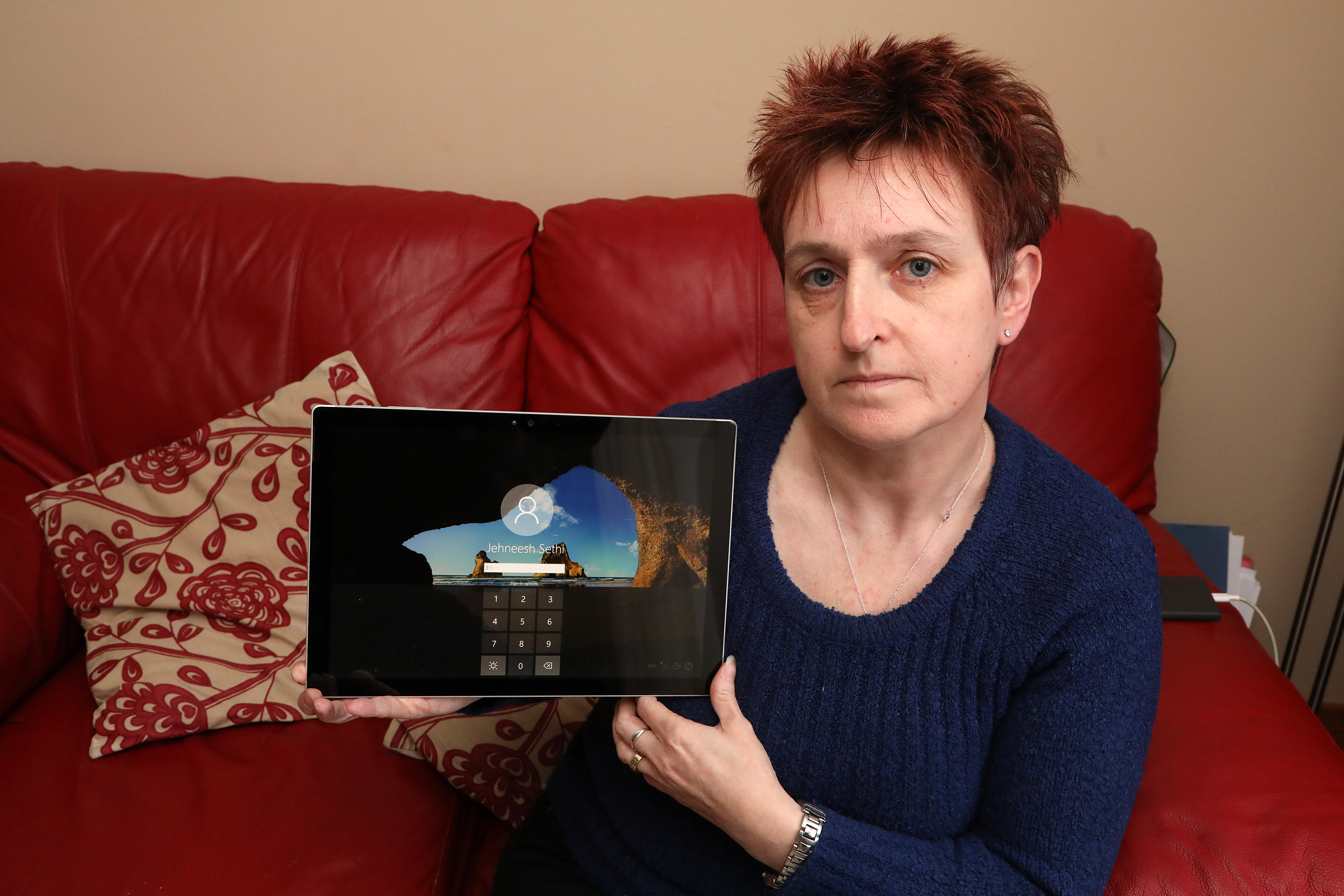 Angela Kingston with the tablet that was sold (and returned) via eBay
