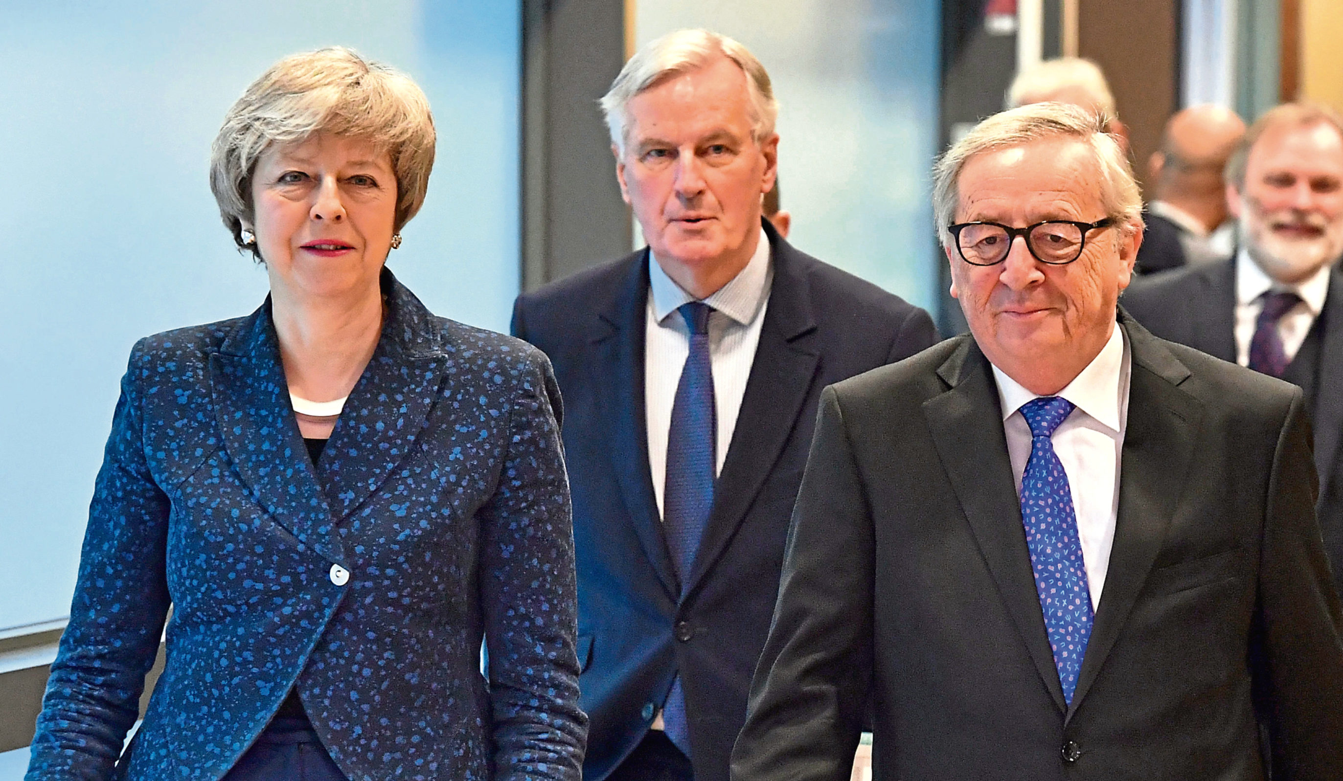European Commission President Jean-Claude Juncker, British Prime Minister Theresa May and European Union chief Brexit negotiator Michel Barnier
