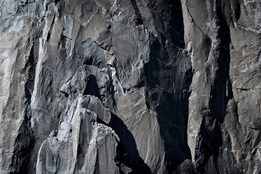 Live the Adventure – Joint Runner-up Alex Palmer (UK) El Capitan, Yosemite National Park, California, USA Two climbers approach El Cap Tower on the The Nose route on El Capitan. I was taking a day off from the route that my partner and I were attempting on the West Face of El Capitan. We headed down to the meadow opposite the peak to watch the climbers on the wall and get some images. The hardest thing I’ve found about photographing this rock face is to get any idea of how vast it really is. I spotted two climbers approaching the El Cap Tower feature and just started to snap photos. When I zoomed in to preview the images, I was really pleased with the scale and atmosphere they showed.