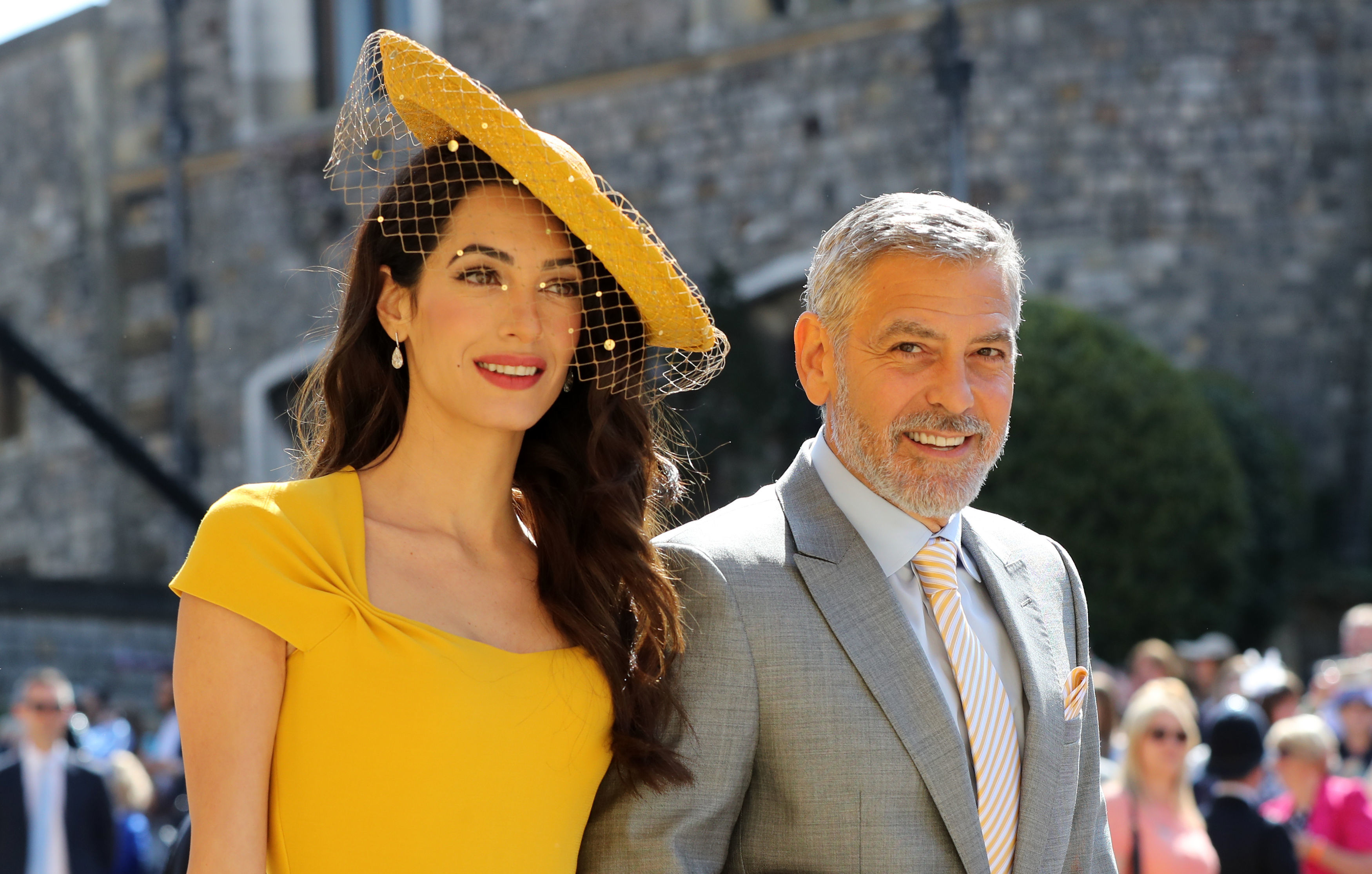 Amal Clooney and George Clooney arrive attending the wedding of Meghan Markle and Prince Harry (Gareth Fuller/PA Wire)