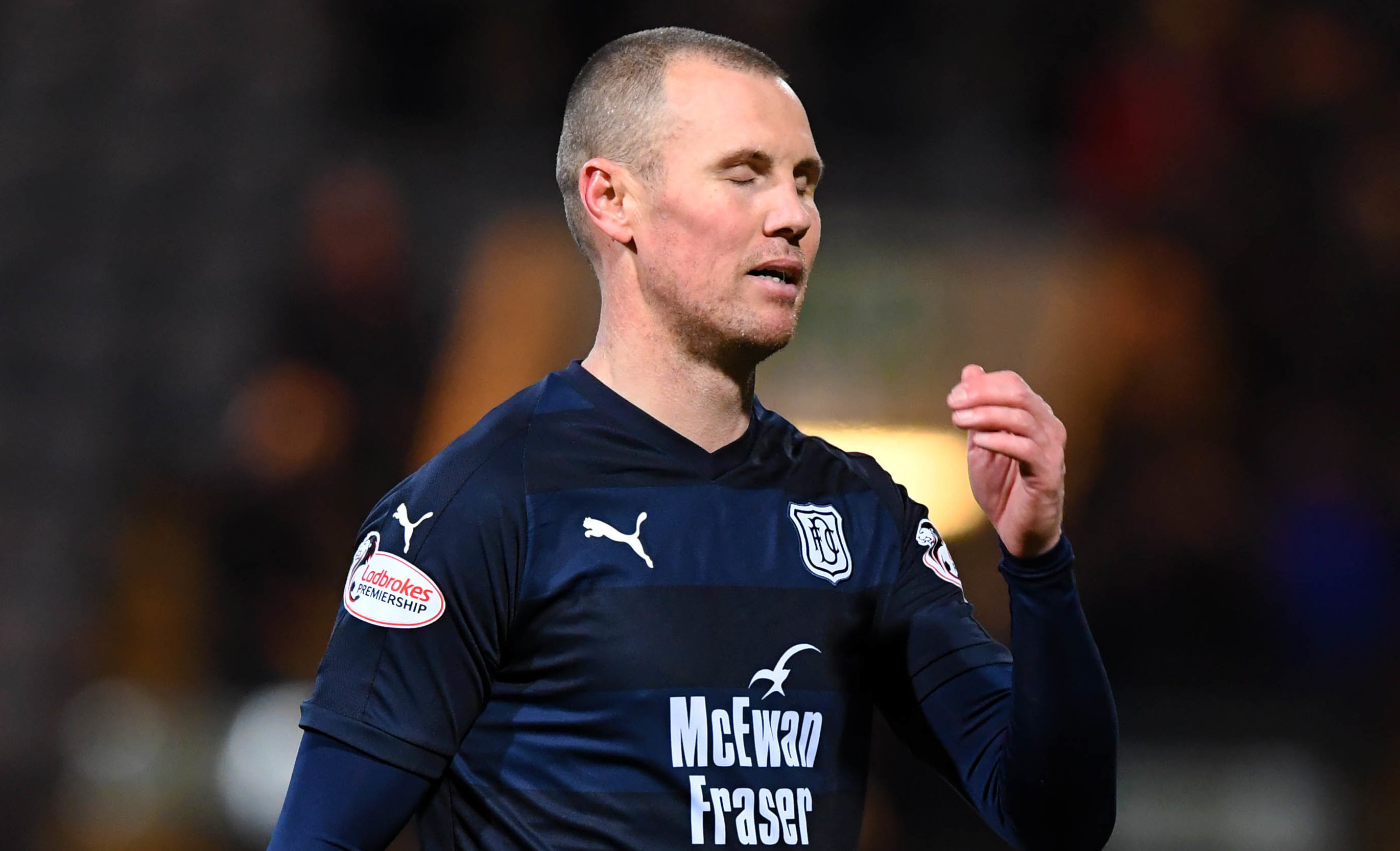 Dundee's Kenny Miller looks dejected at full-time (SNS Group / Gary Hutchison)