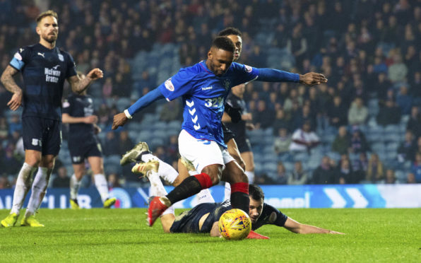 Jermain Defoe scores an emphatic fourth goal against Dundee