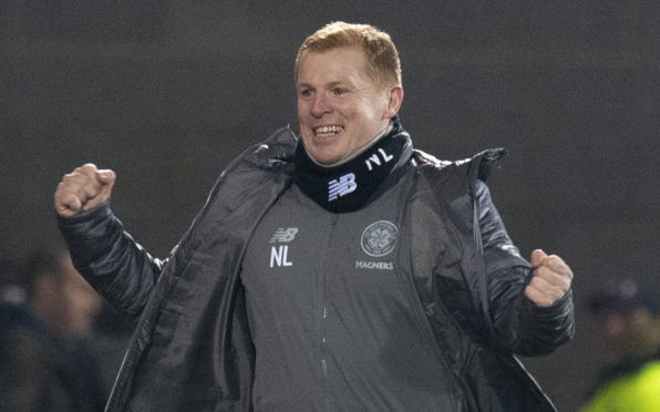 Celtic manager Neil Lennon celebrates Odsonne Edouard';s late goal