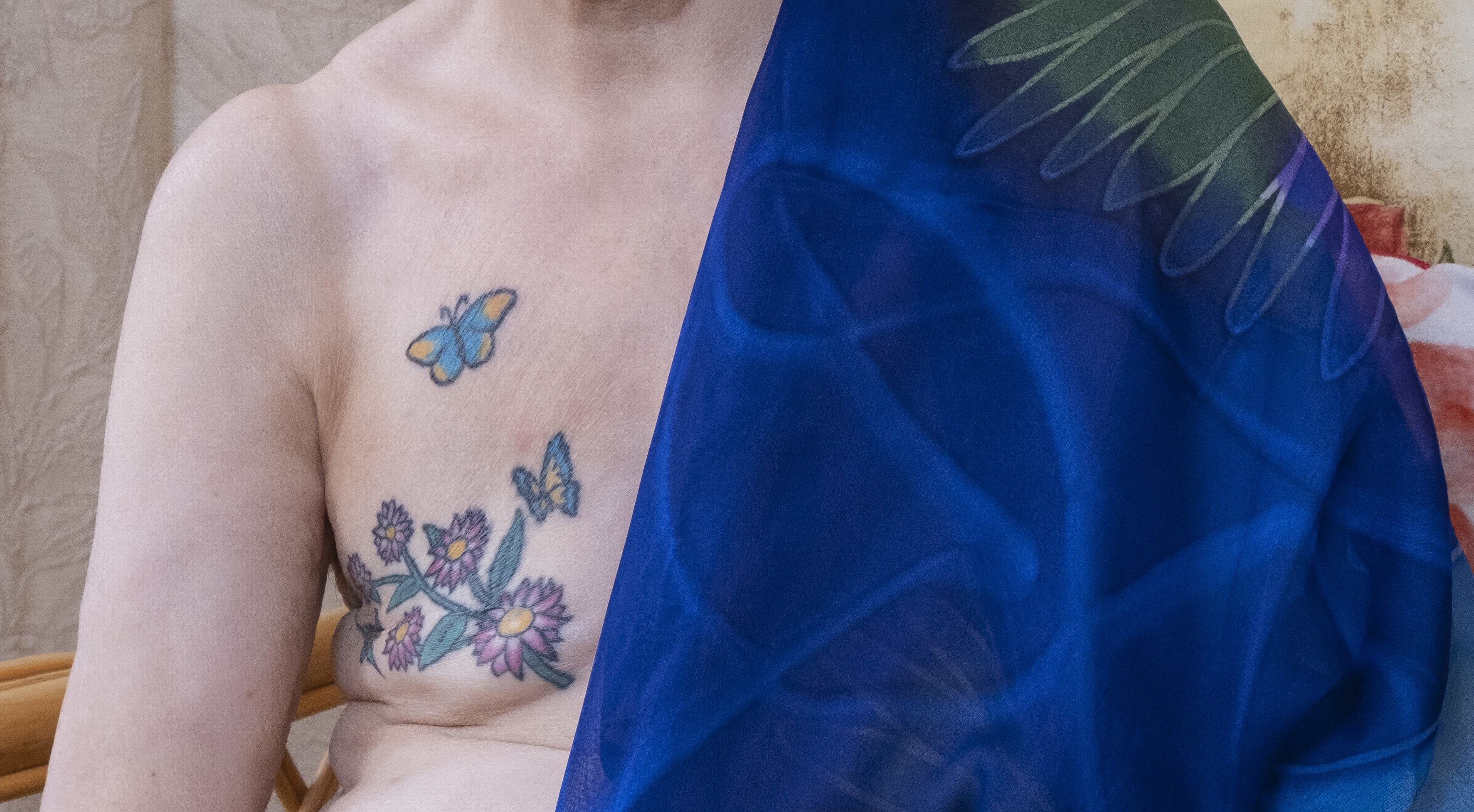 Liz Howley's tattoo over her mastectomy scar. (Tina Norris).