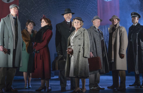 Juliet Mills and Maxwell Caulfield, centre, with the cast of The Lady Vanishes