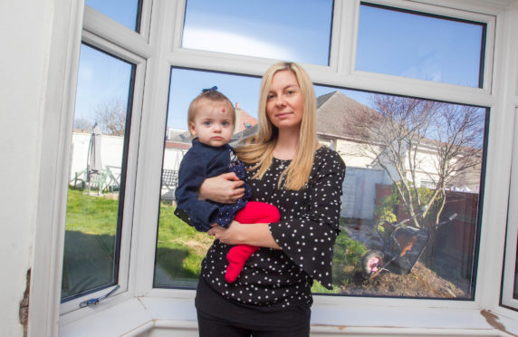 Jen Baillie has had problems with their new windows. Jen with daughter Lily-Rose.