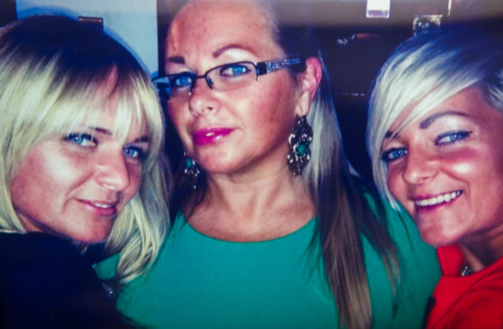 Elaine, centre, with sisters Leanne, left and Maryellen