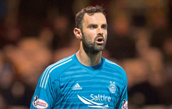 Joe Lewis in action for Aberdeen