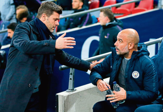x
Tottenham Hotspur's Argentinian head coach Mauricio Pochettino (L) greets Manchester City's Spanish manager Pep Guardiola ahead of the English Premier League football match between Tottenham Hotspur and Manchester City at Wembley Stadium in London, on October 29, 2018. (Photo by Ian KINGTON / IKIMAGES / AFP) / RESTRICTED TO EDITORIAL USE. No use with unauthorized audio, video, data, fixture lists, club/league logos or 'live' services. Online in-match use limited to 45 images, no video emulation. No use in betting, games or single club/league/player publications.        (Photo credit should read IAN KINGTON/AFP/Getty Images)