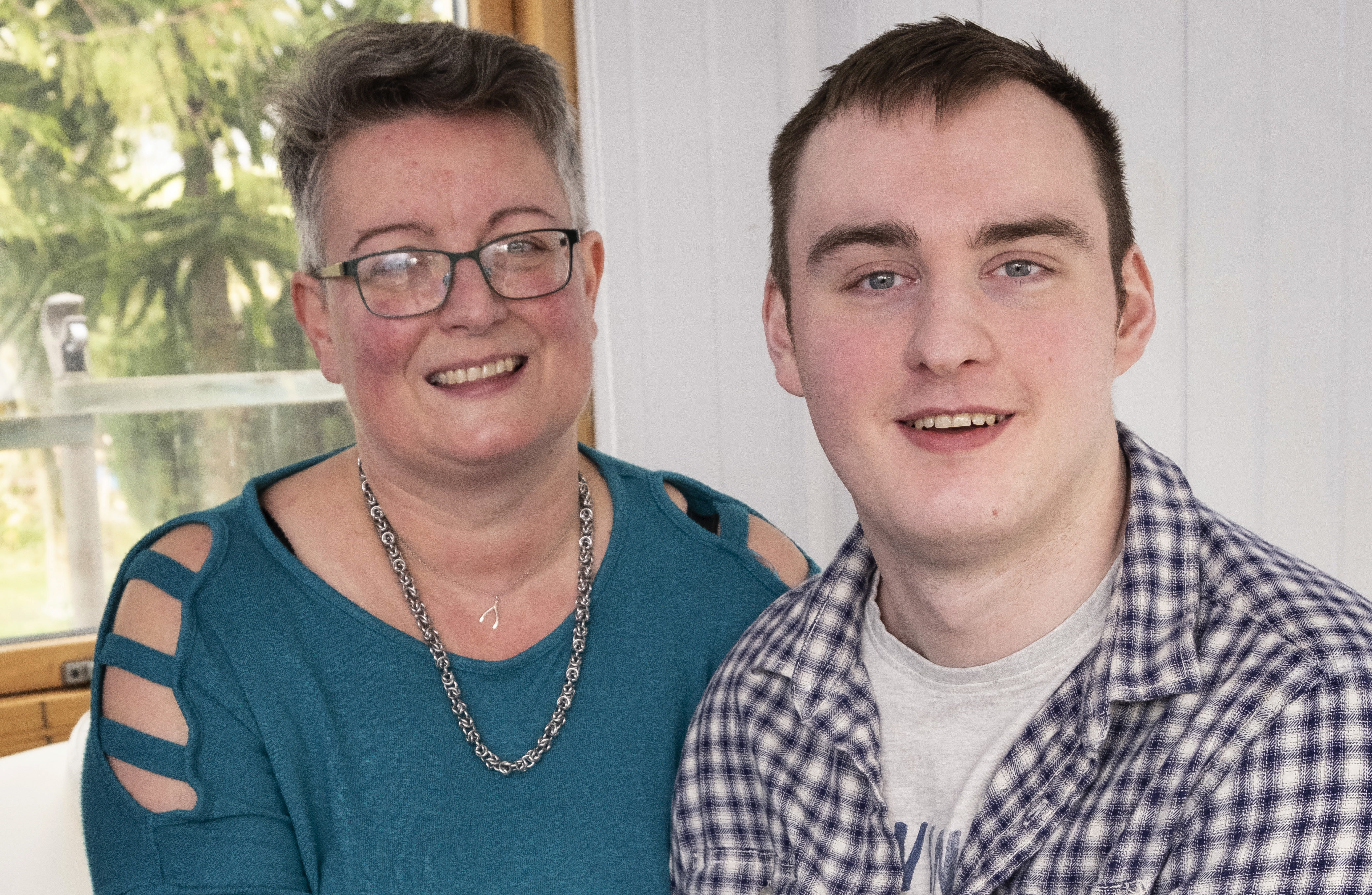 Ashley Palmer with his mother Angela McIntyre