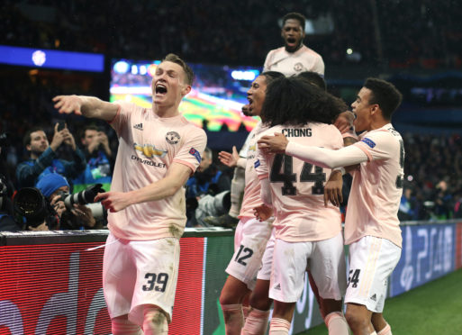 PARIS, FRANCE - MARCH 06:  Scott McTominay of Manchester United celebrates victory  after the UEFA Champions League Round of 16 Second Leg match between Paris Saint-Germain and Manchester United at Parc des Princes on March 6, 2019 in Paris, . (Photo by Mark Leech/Offside/Getty Images)
