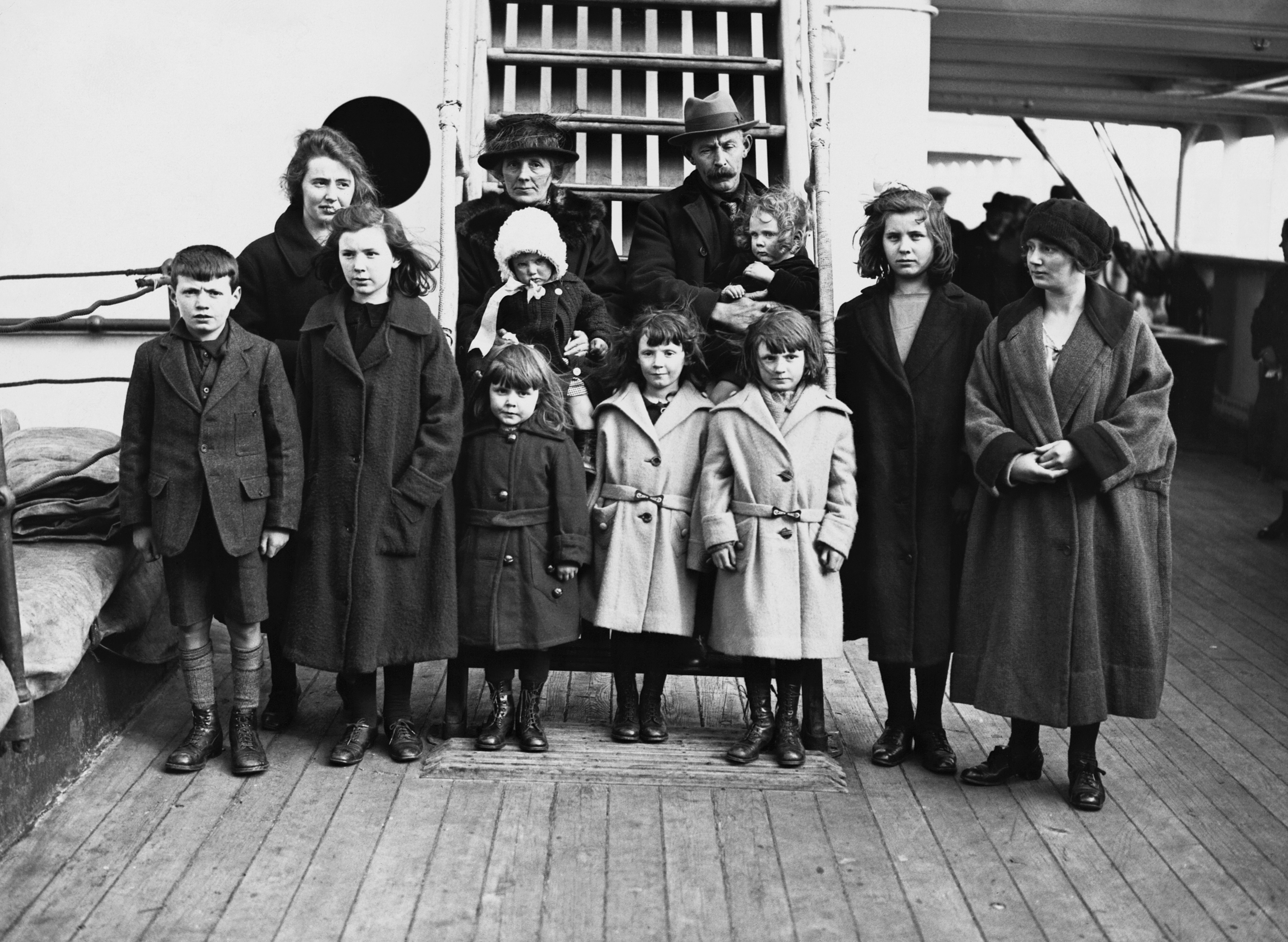 A family of twelve from the Hebrides on the deck of the Marlock, enroute to Canada.