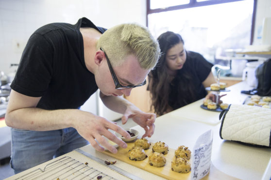 Runner-up Philip Miller prepares his scones for the oven