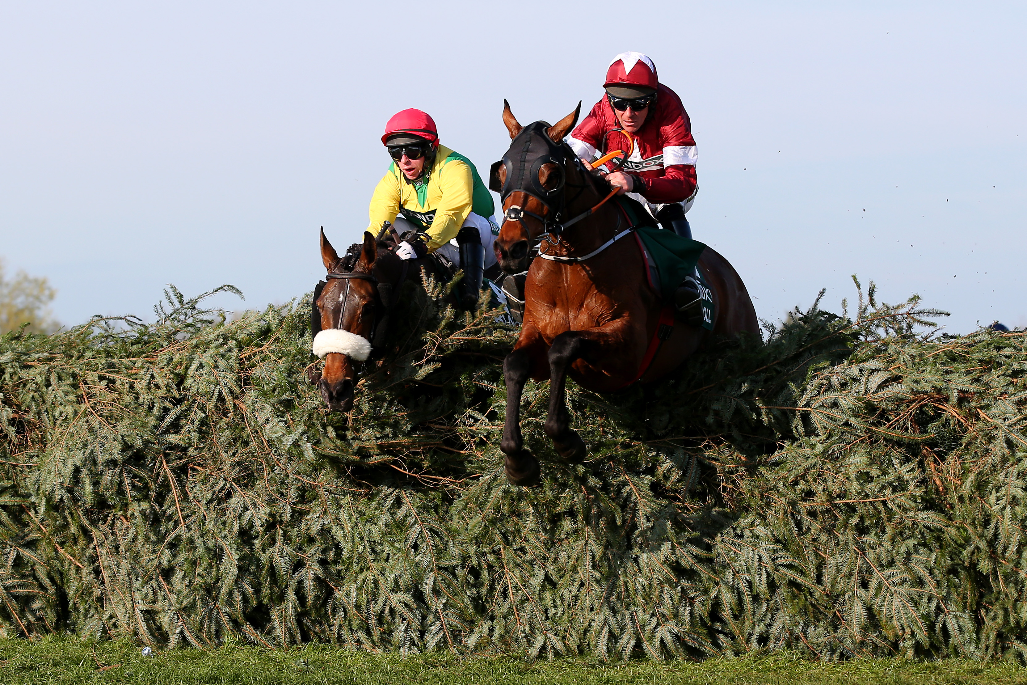 Davy Russell riding Tiger Roll clears the final fence as he races to victory during the Randox Health Grand National