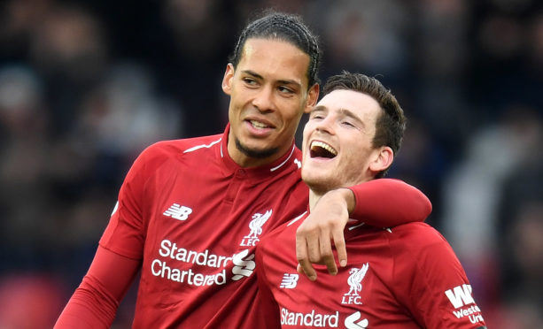 Liverpool's Virgil Van Dijk and Andy Robertson