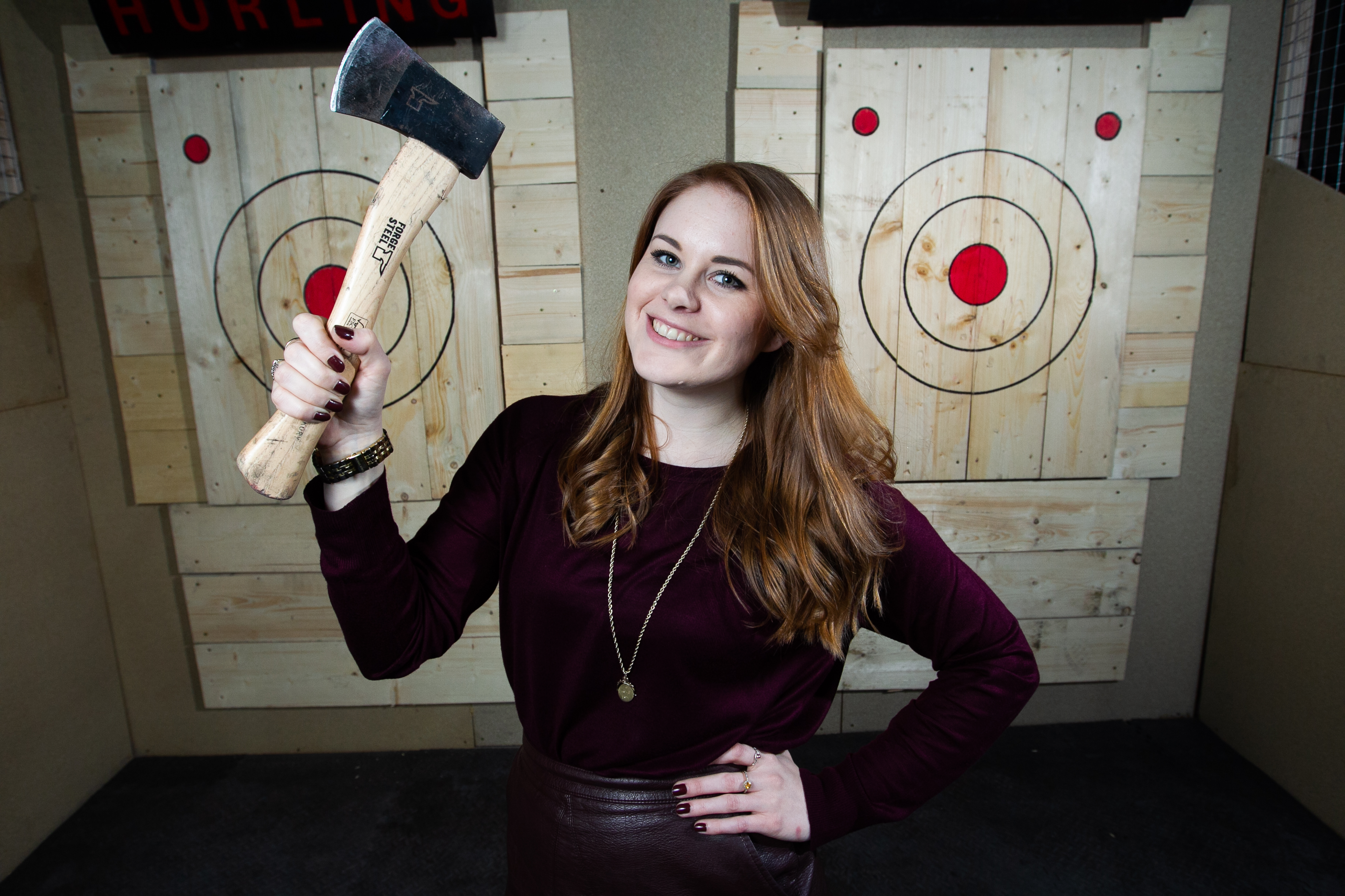 Sunday Post reporter Alice Hinds having a go at axe throwing