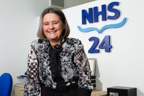 Margaret McGee, pharmacist, who works as a call handler at NHS 24 .