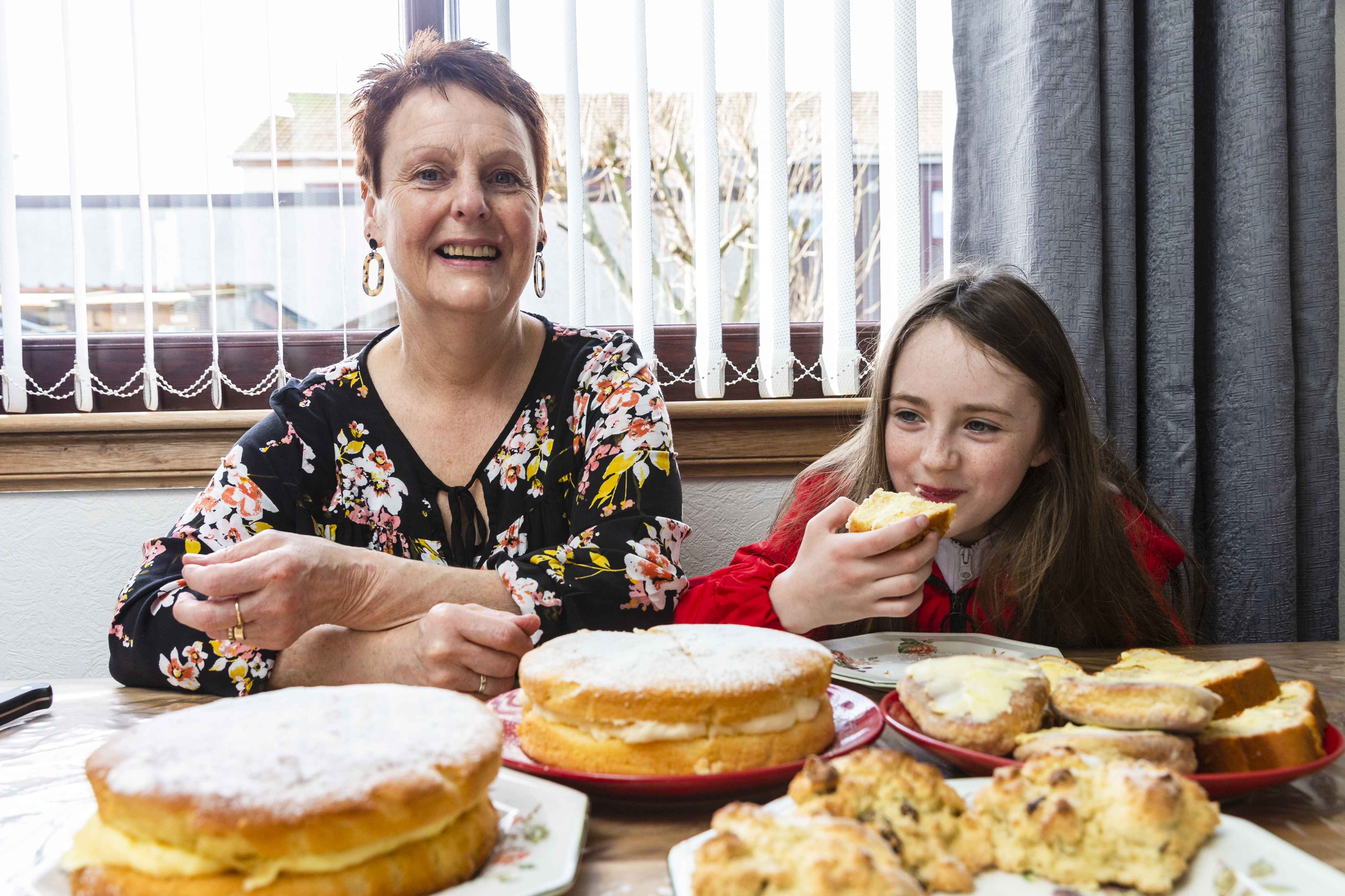 Anne Mclean, who makes scones and cakes for the ice cream shop she works in got a new oven which was faulty. When the repairman came to look at it her told her it was her cooking that had caused the problem. Anne pictured with her granddaughter Heidi McLean, 6, enjoying some of the cakes she bakes.