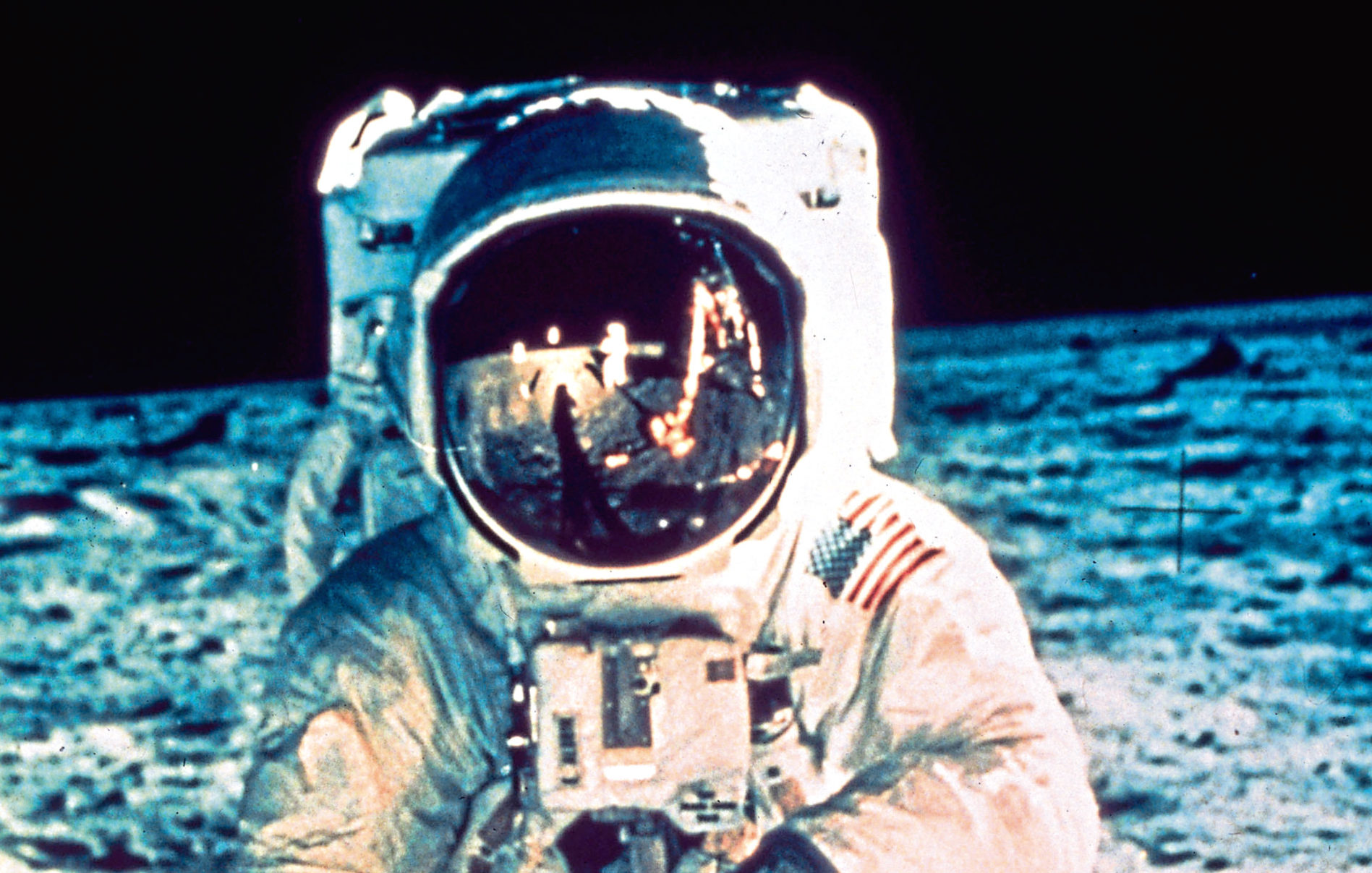 Neil Armstrong, seen reflected in Buzz Aldrin's visor