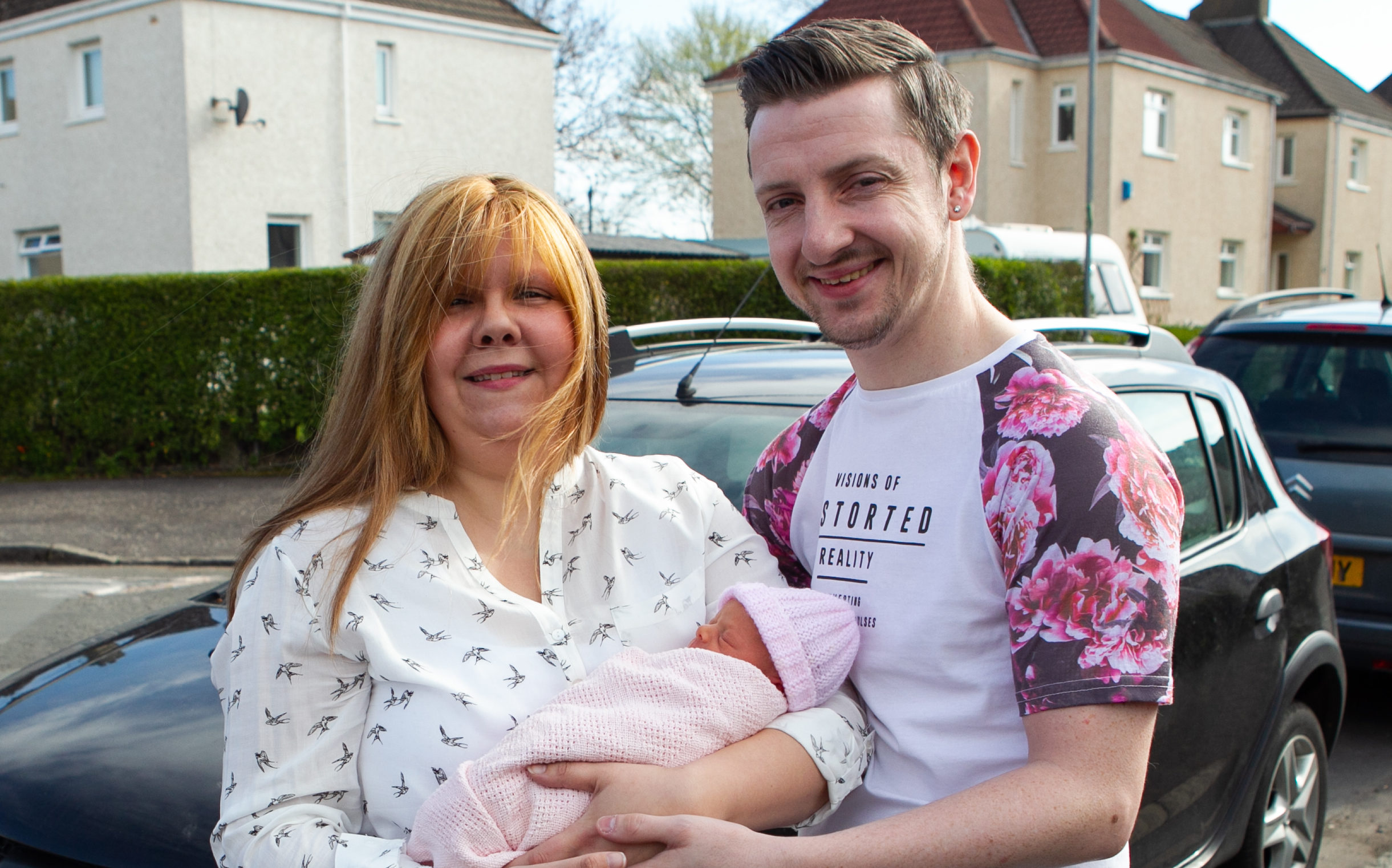 Chris and Carol Sichi, with their newborn baby girl, Kori