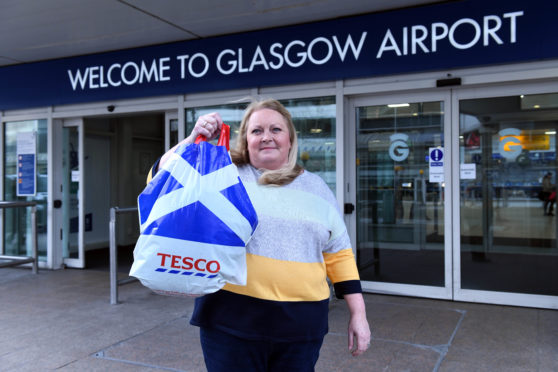 Clare Anderson had to use a Tesco carrier bag instead of her specially purchased case