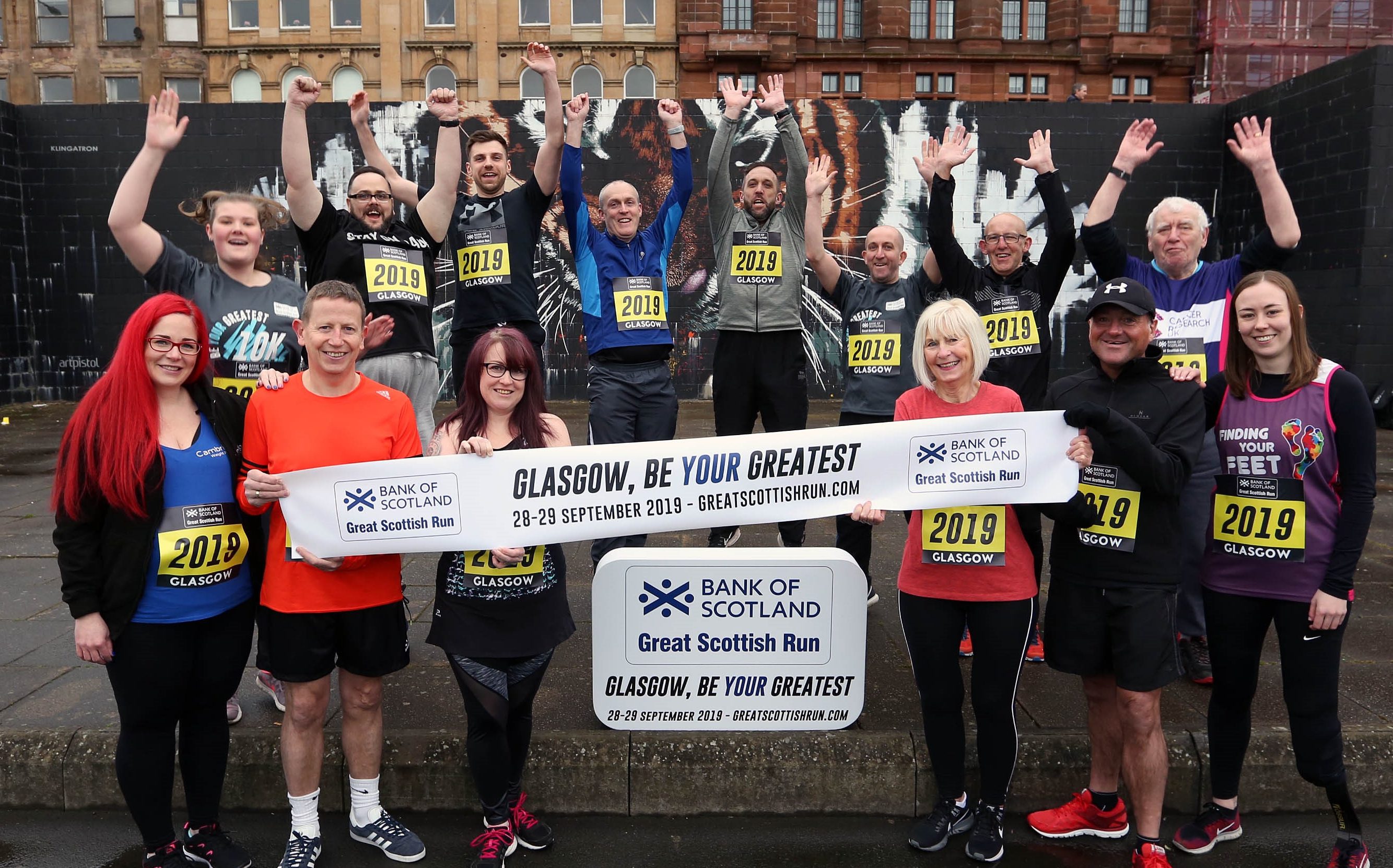 Runners gather to launch this year's Great Scottish Run on the banks of the Clyde