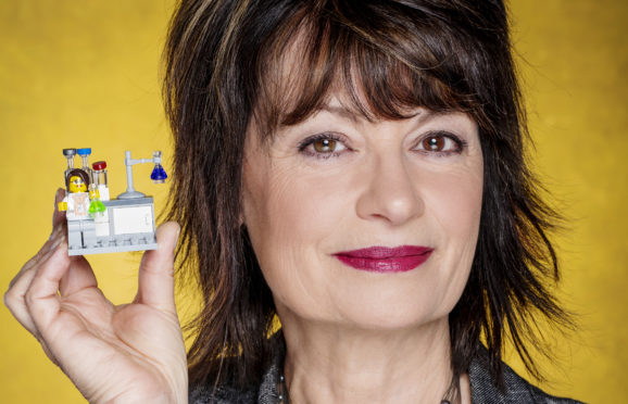 Prof Dame Anne Glover FRS, special adviser to the Principal at University of Strathclyde.

Anne is holding a Lego model of a female scientist in a lab, selected to symbolise her role in mentoring young women in STEM. It was a present from a colleague