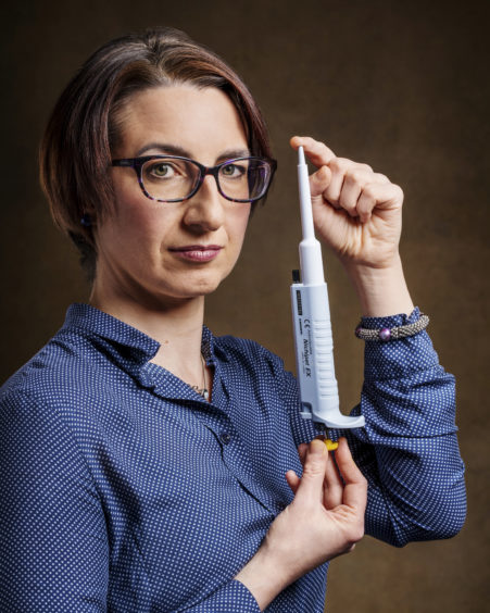 ITALY: Dr Silvia Paracchini FRSE, School of Medicine, University of St Andrews, a human geneticist focusing on the genetic basis of dyslexia.

She is holding a single-channel pipette, which she likens to an extension of her arm as her work consists of mixing tiny, very precise volumes of different reagents