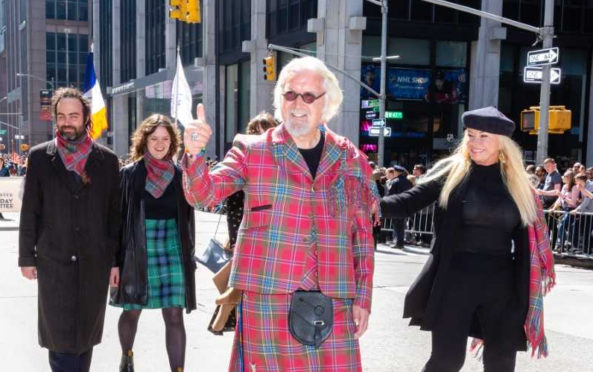 Sir Billy Connolly leading the New York City Tartan Day Parade as Grand Marshal