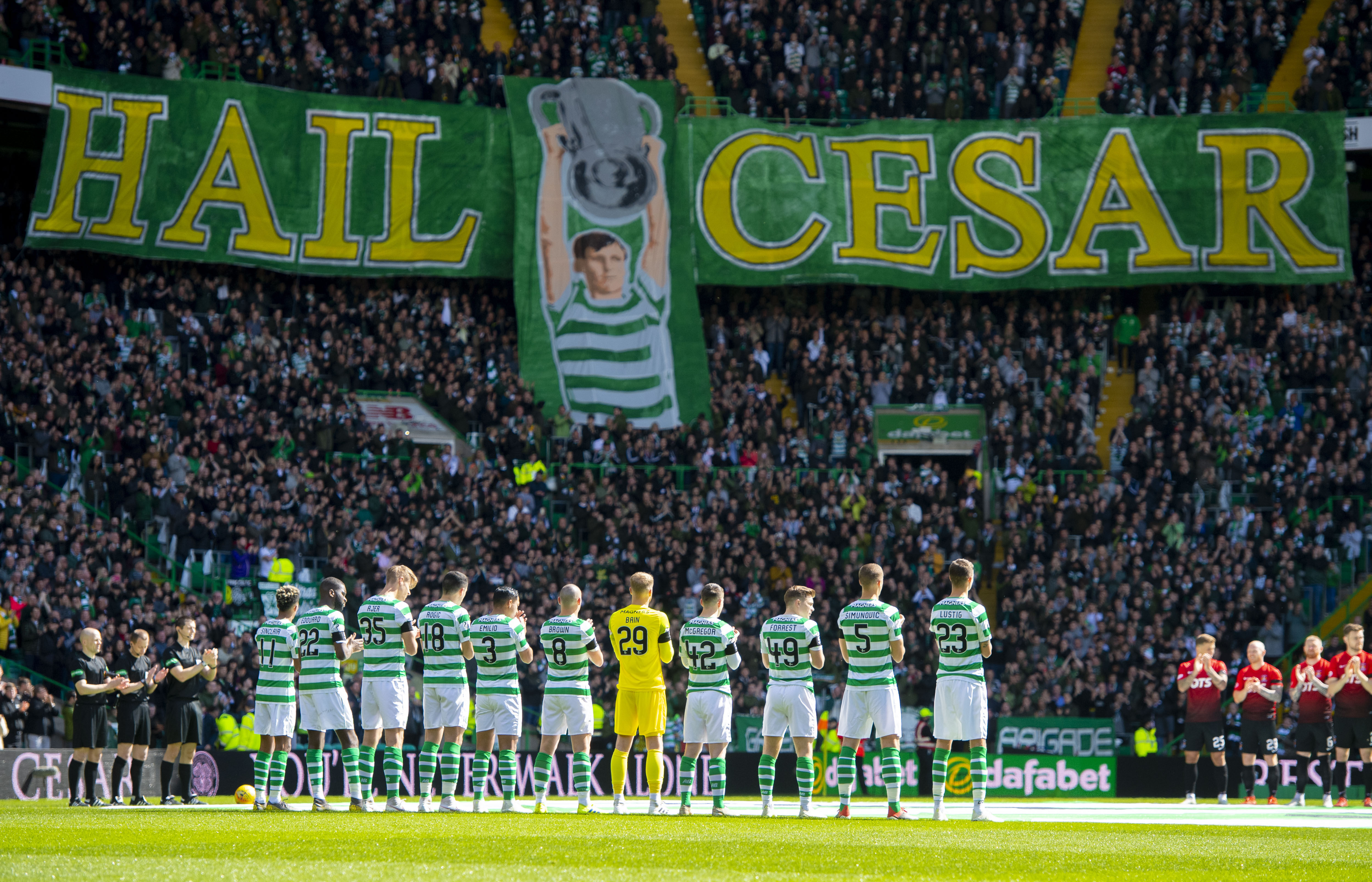 Celtic and Kilmarnock's players observe a minute's applause on an emotional day as the club pay tribute to European Cup winning captain Billy McNeill