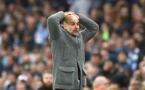 Pep Guardiola can't believe it as the goal is ruled out