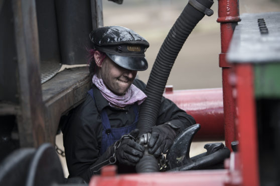 Jayne Louise Wright , fireman at Bo'ness & Kinneil Railway , on the steam locomotive on Tuesday