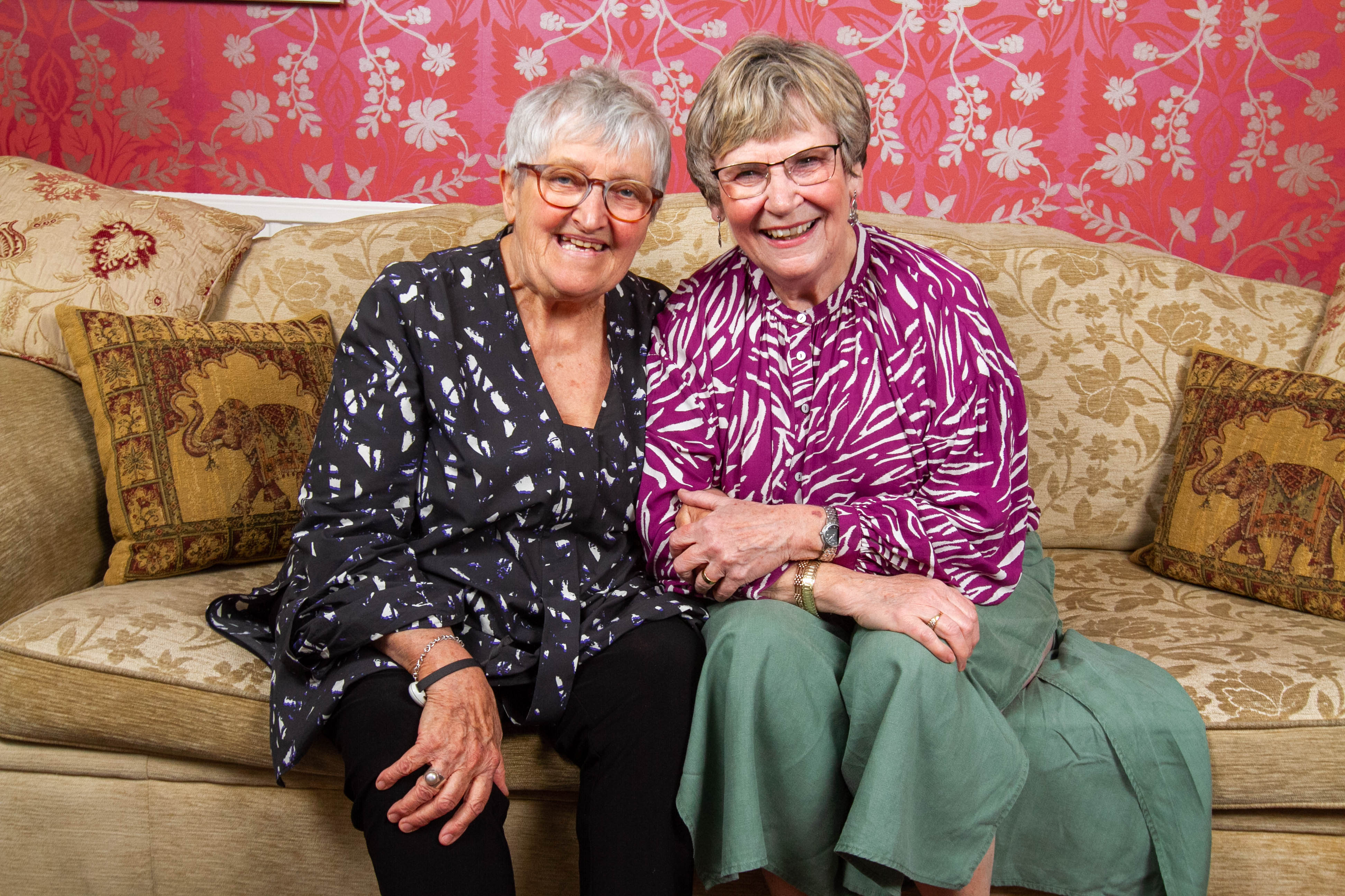 Terry Cunningham (purple) and her friend Rosemary have been friends for years.