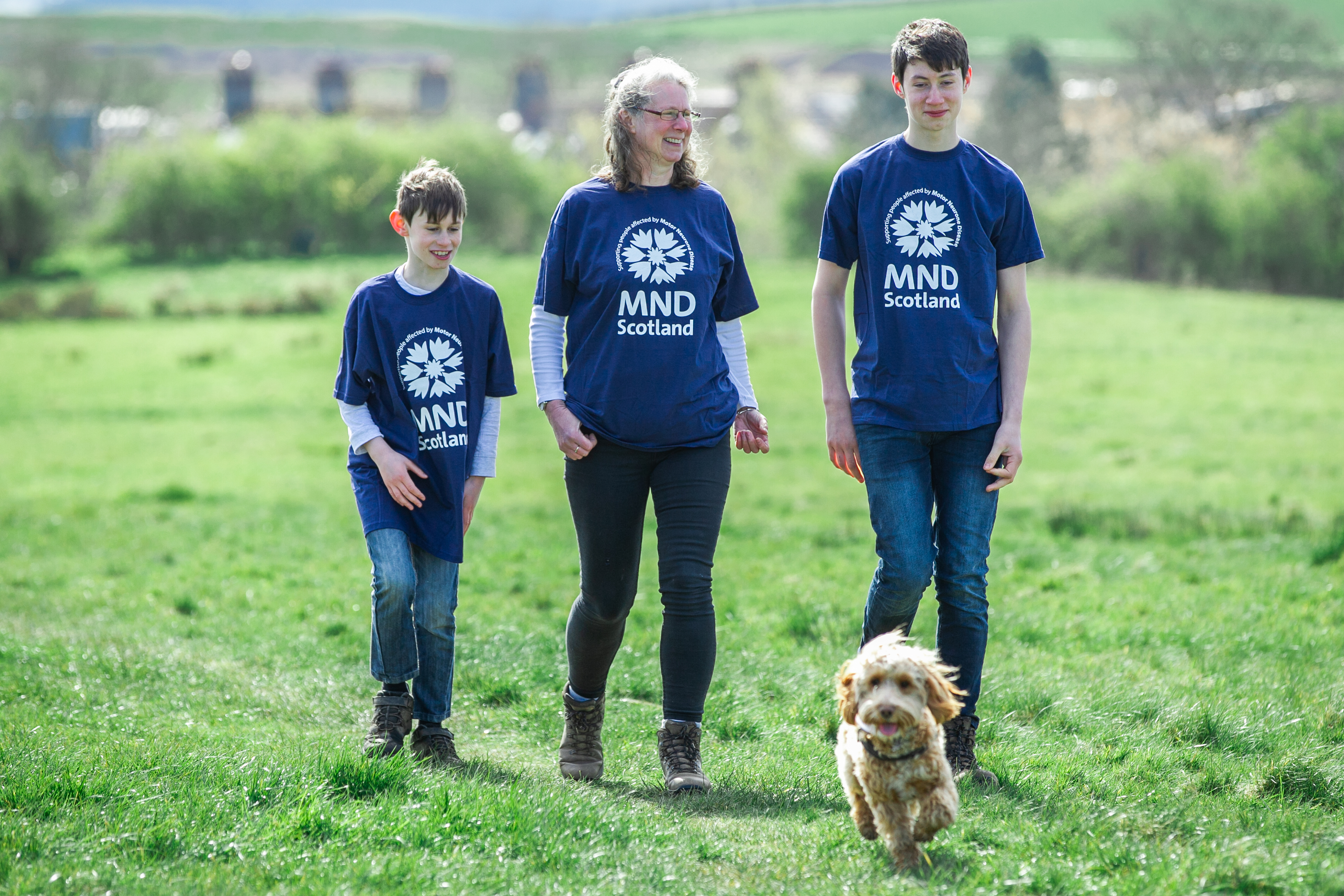 Widow Karen Corrie with her sons Euan (9) and Jamie (15) and dog Sula