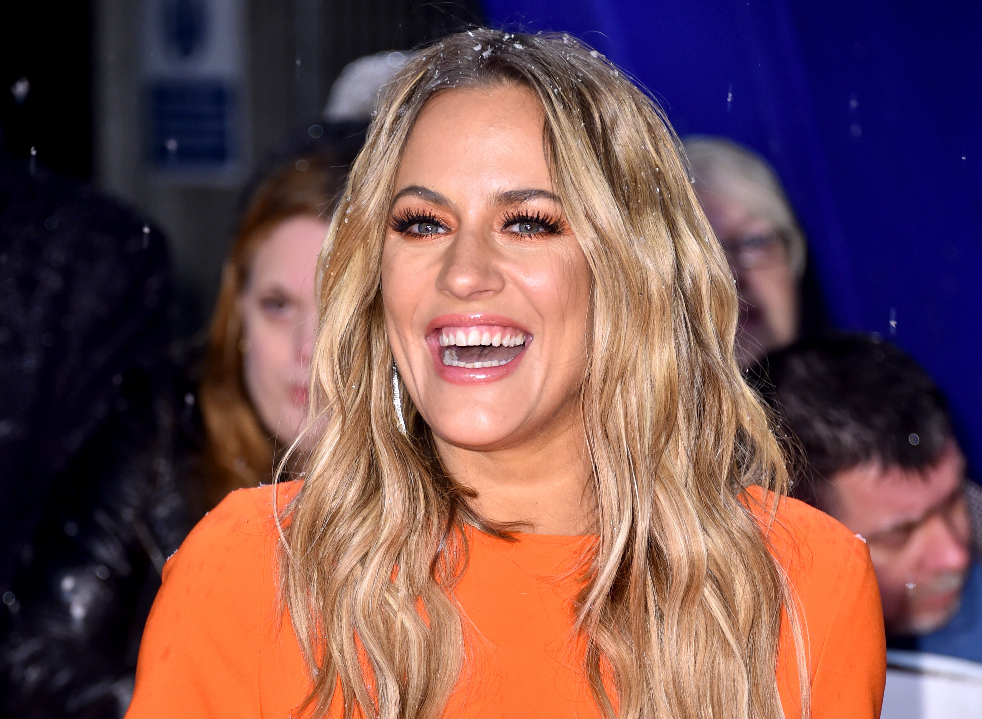 Caroline Flack has defended Love Island following the deaths of two former contestants, saying negative headlines about the show made her "angry".