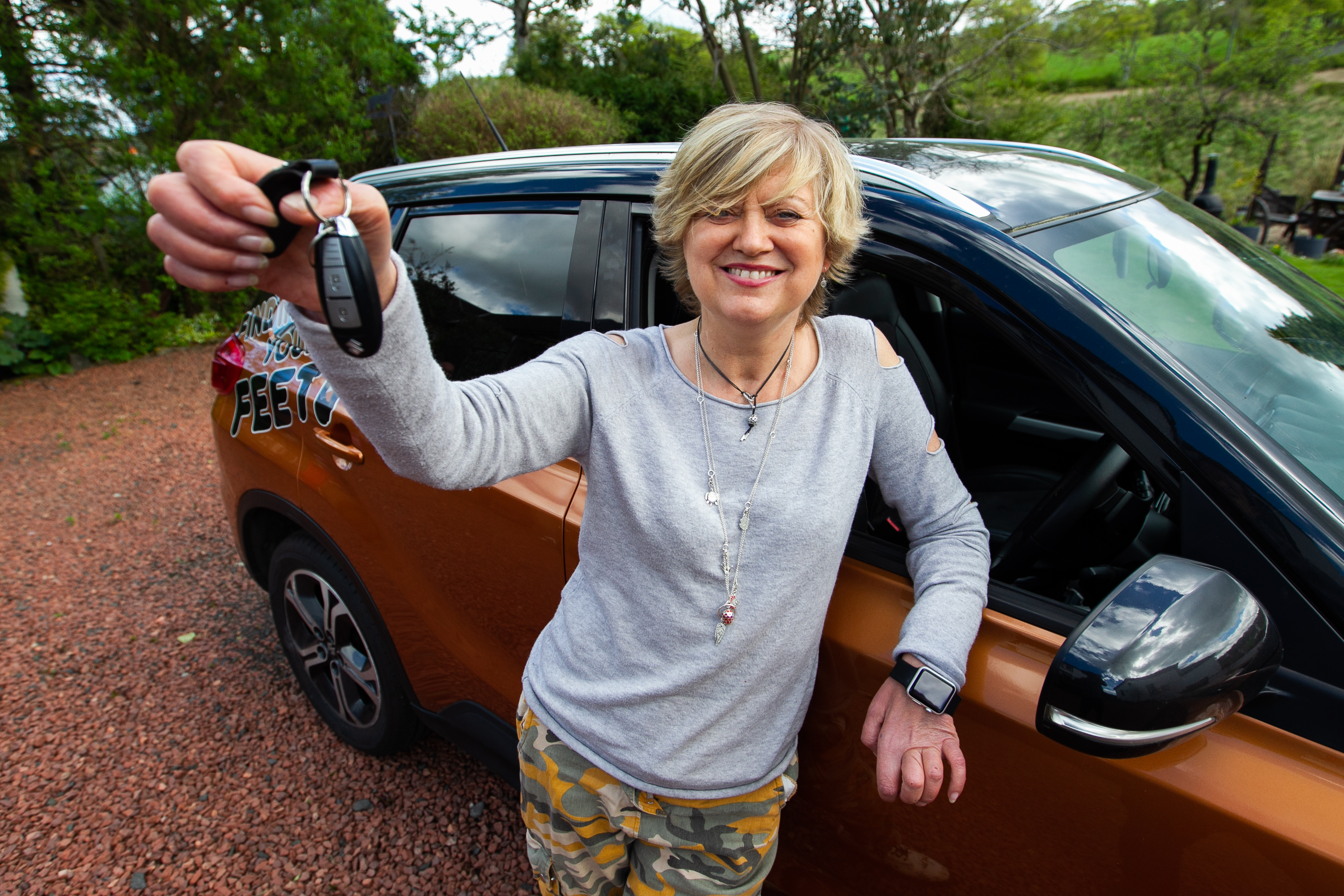 Corinne Hutton holds the keys to her Suzuki Vitari in her new hands  before going for a first spin