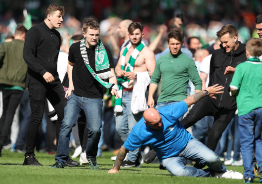 Hibernian and Rangers supporters clash on Hampden Park pitch following the 2016 Scottish Cup Final
