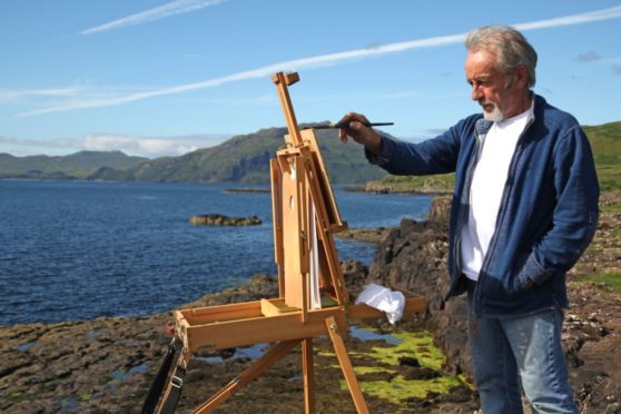 Alan Hayman paints near his gallery at Drimnin.