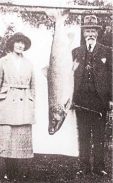 Georgina Ballantine with her 64lb salmon in 1922.