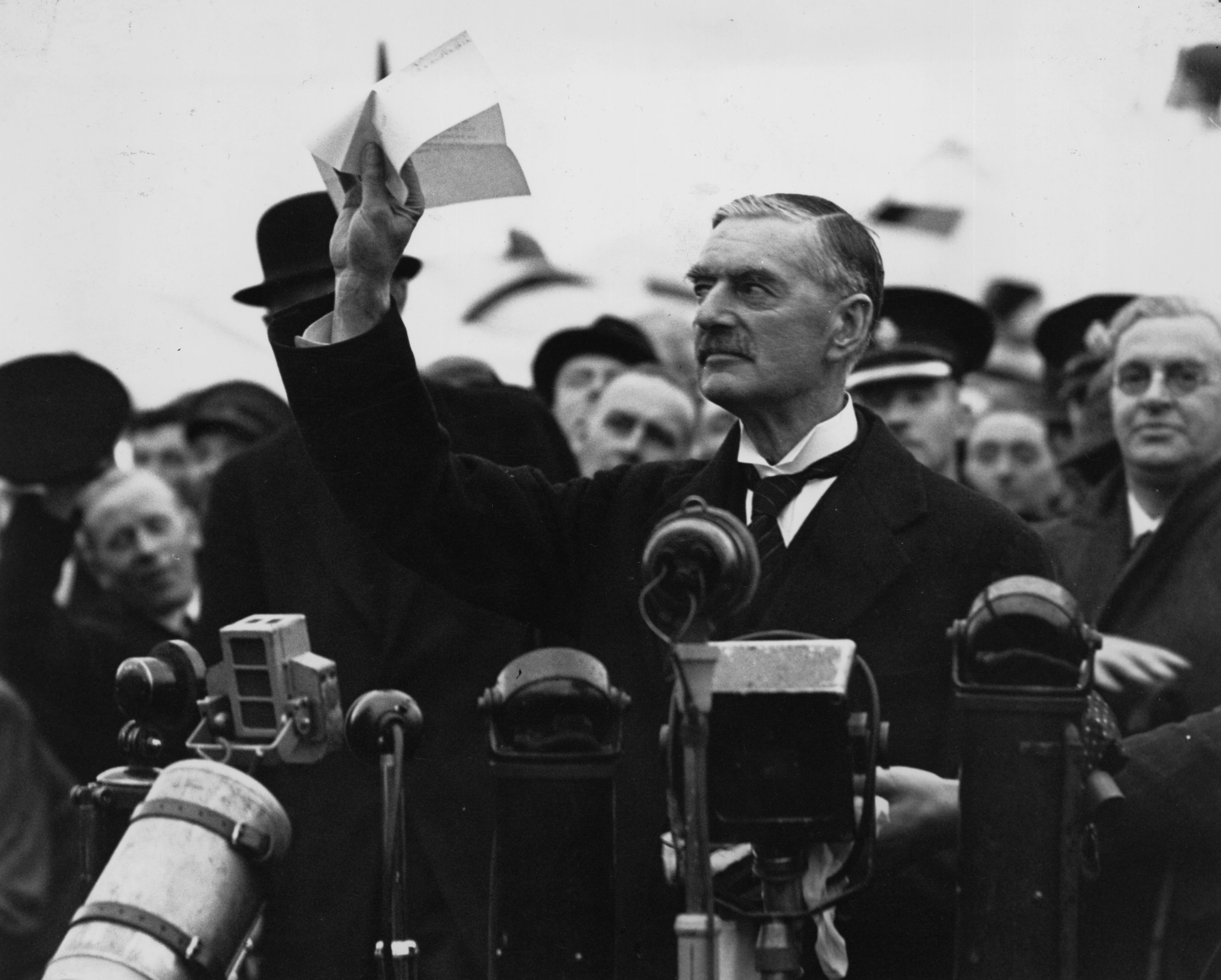 Prime Minister Neville Chamberlain delivers his famous “Peace for our time” speech on September 30, 1938