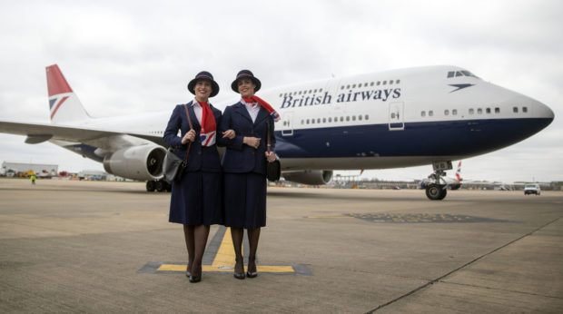 Ambassadors Elysa Marsden (left) Olivia Welch in front of a Boeing 747 in  British Airways' centenary fleet