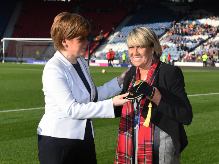 Former Scotland Women's international Rose Reilly (R) with First Minister Nicola Sturgeon ahead of kick-off