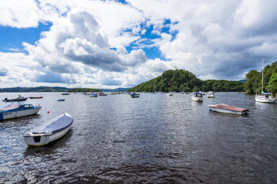 Boats near Balmaha with Inchcailloch Island in the distance.