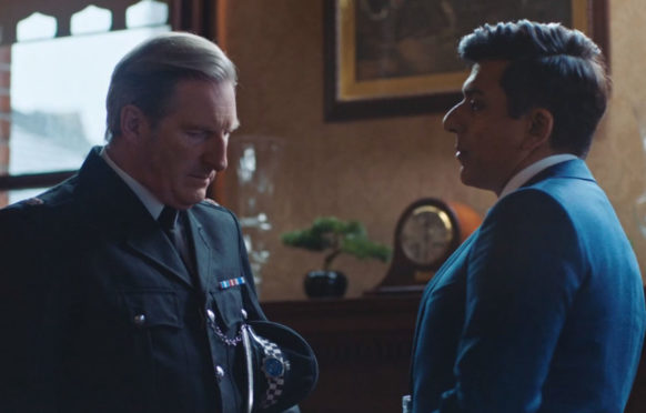 Ace Bhatti, as Rohan Sindwhani, with co-star Adrian Dunbar